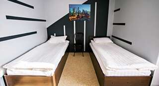 Гостиница Центр Сити Комсомольск-на-Амуре Стандартный двухместный номер с 2 отдельными кроватями-1